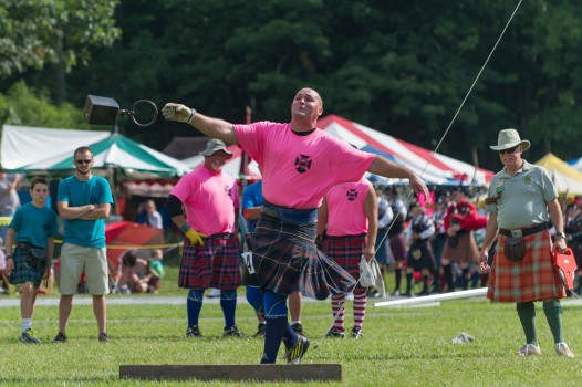 Athlete Eric Frasure competes in the hammer throw at the 2014 Grandfather Mountain Highland Games. Photo by Skip Sickler.